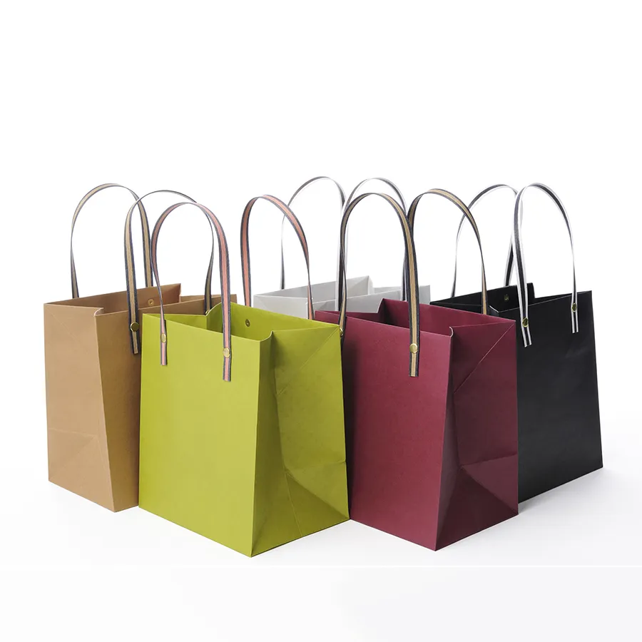 Wholesale Custom Printing Luxury Personalized Degradable Packaging Button Shopping Gift Kraft Cardboard Paper Bag with Handle