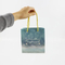 Wholesale Custom Print Luxury Personalized Degradable Recyclable Shopping Gift Fruit Food Electronic Product Packaging Kraft Cardboard Paper Bag with Handle
